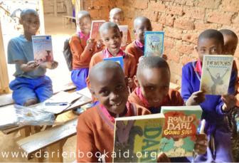 Kids with Darien Book Aid books